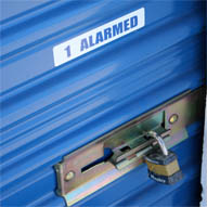 A photo of a lock on an alarmed door.